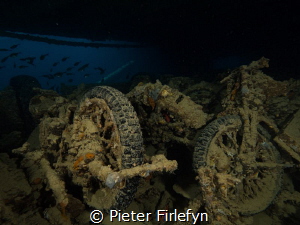 Motorcycles in the Thistlegorm wreck by Pieter Firlefyn 
